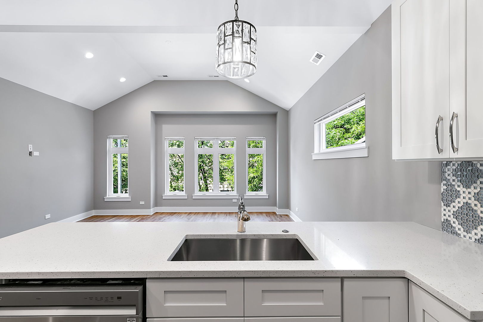 643 East 50th Street Chicago, IL 60615 - Photo 4 of 22 a kitchen with a sink and a window