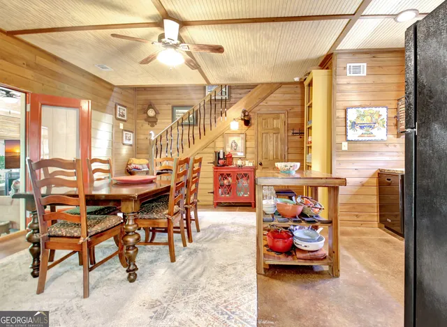 a kitchen with stainless steel appliances granite countertop a stove and a microwave