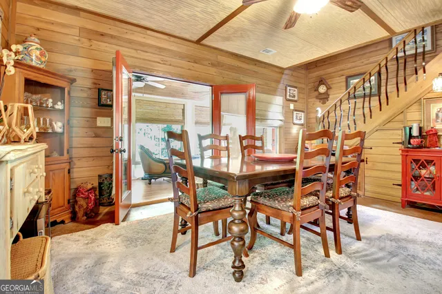 a kitchen with stainless steel appliances granite countertop a refrigerator and a stove