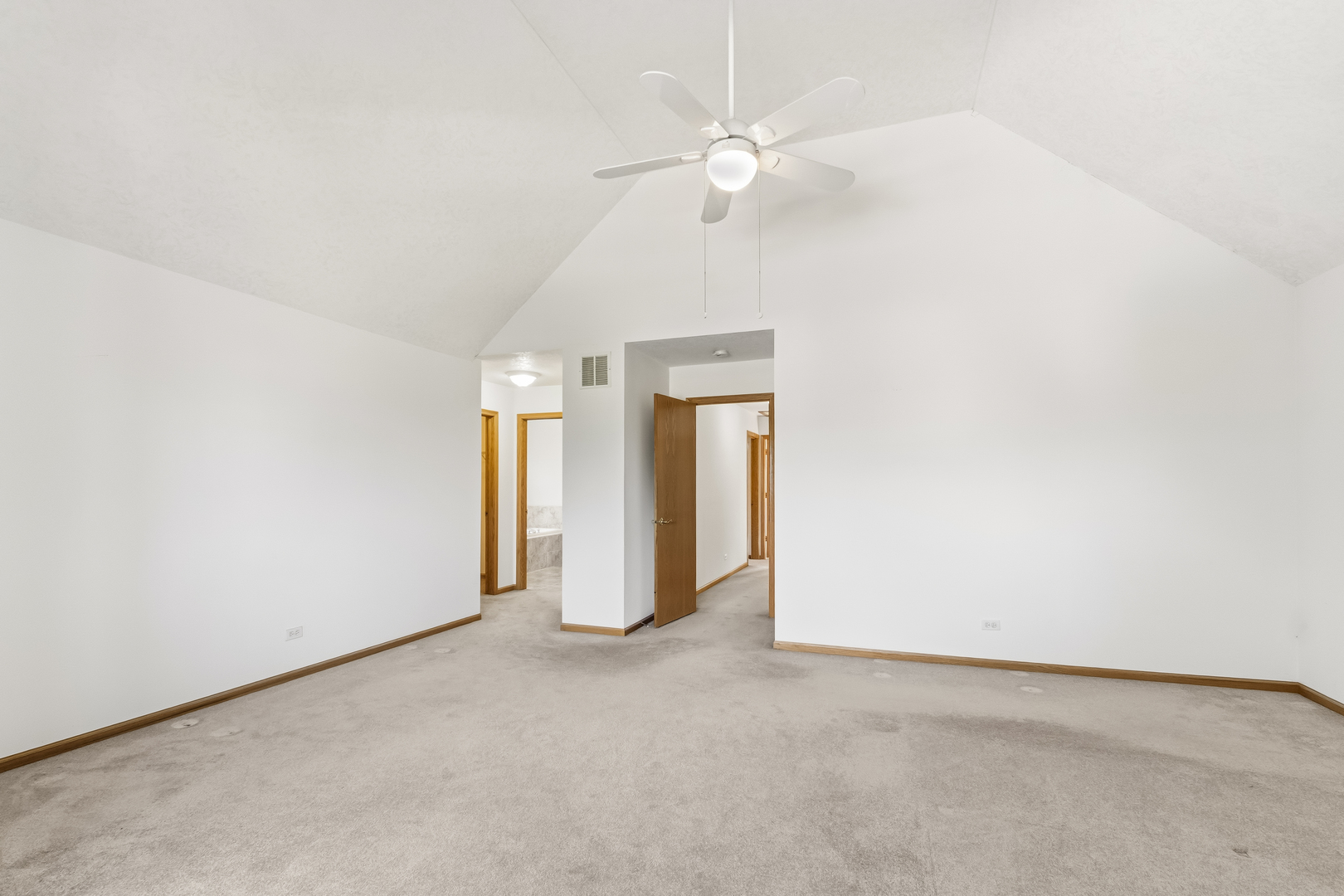 546 Fourth Avenue Addison, IL 60101 - Photo 23 of 39 an empty room with chandelier fan and closet area