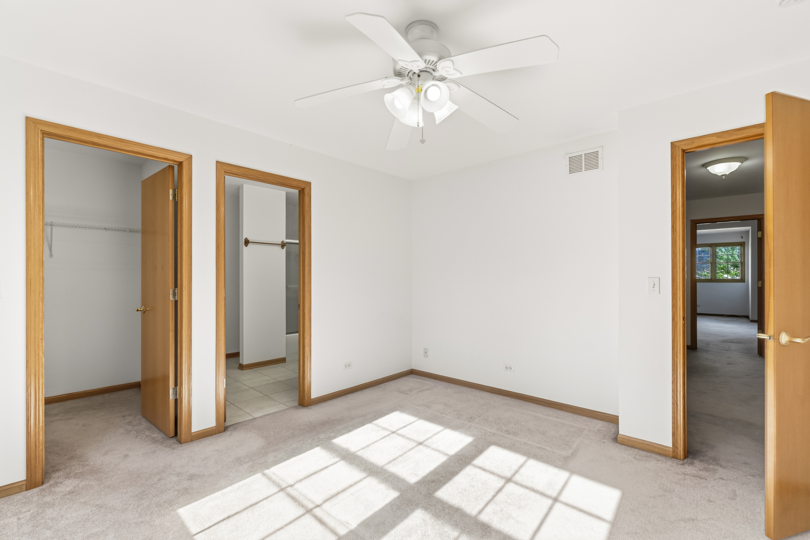 546 Fourth Avenue Addison, IL 60101 - Photo 26 of 39 an empty room with windows and fan