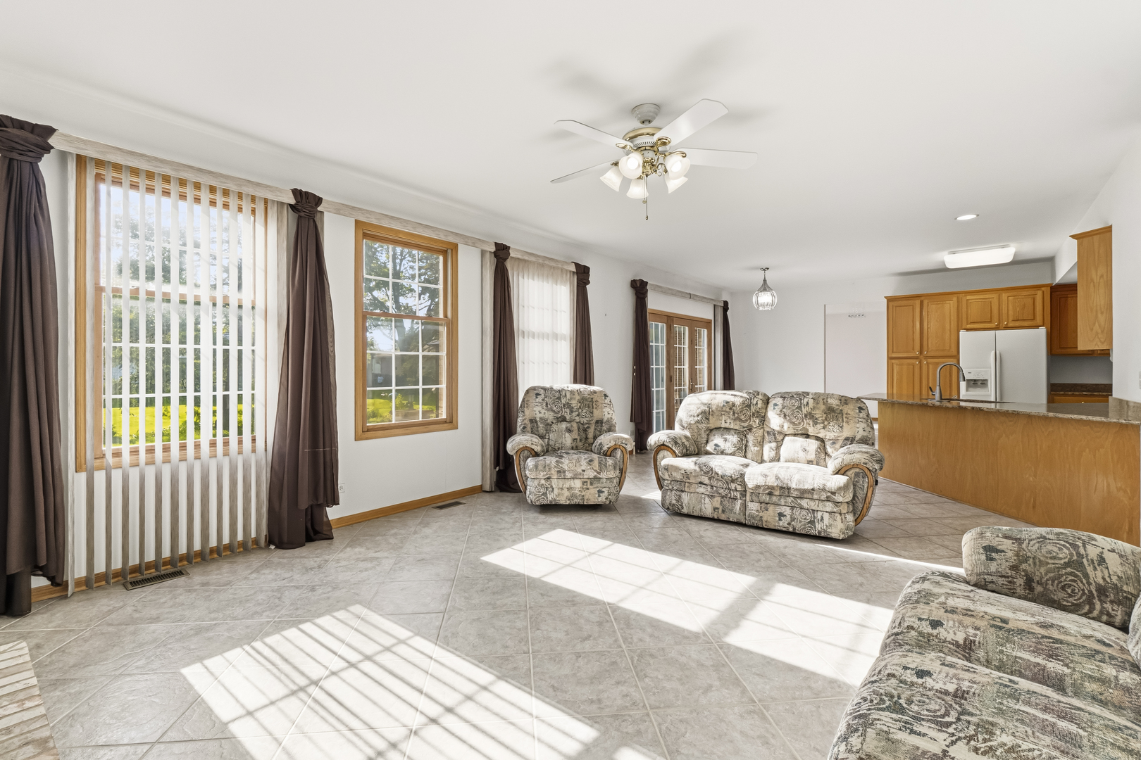 546 Fourth Avenue Addison, IL 60101 - Photo 8 of 39 a living room with furniture and large windows