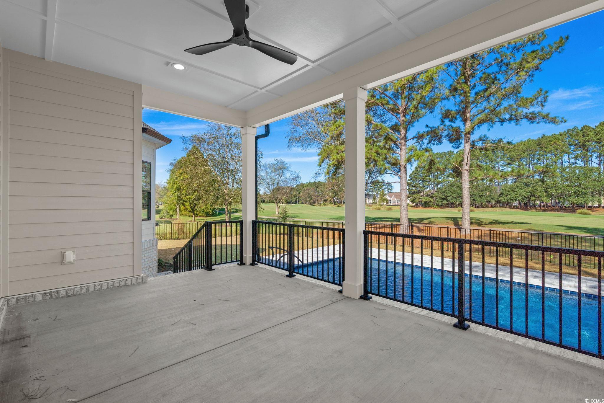 9282 Checkerberry Square Calabash, NC 28467 - Photo 12 of 40 View of patio featuring ceiling fan and golf course view