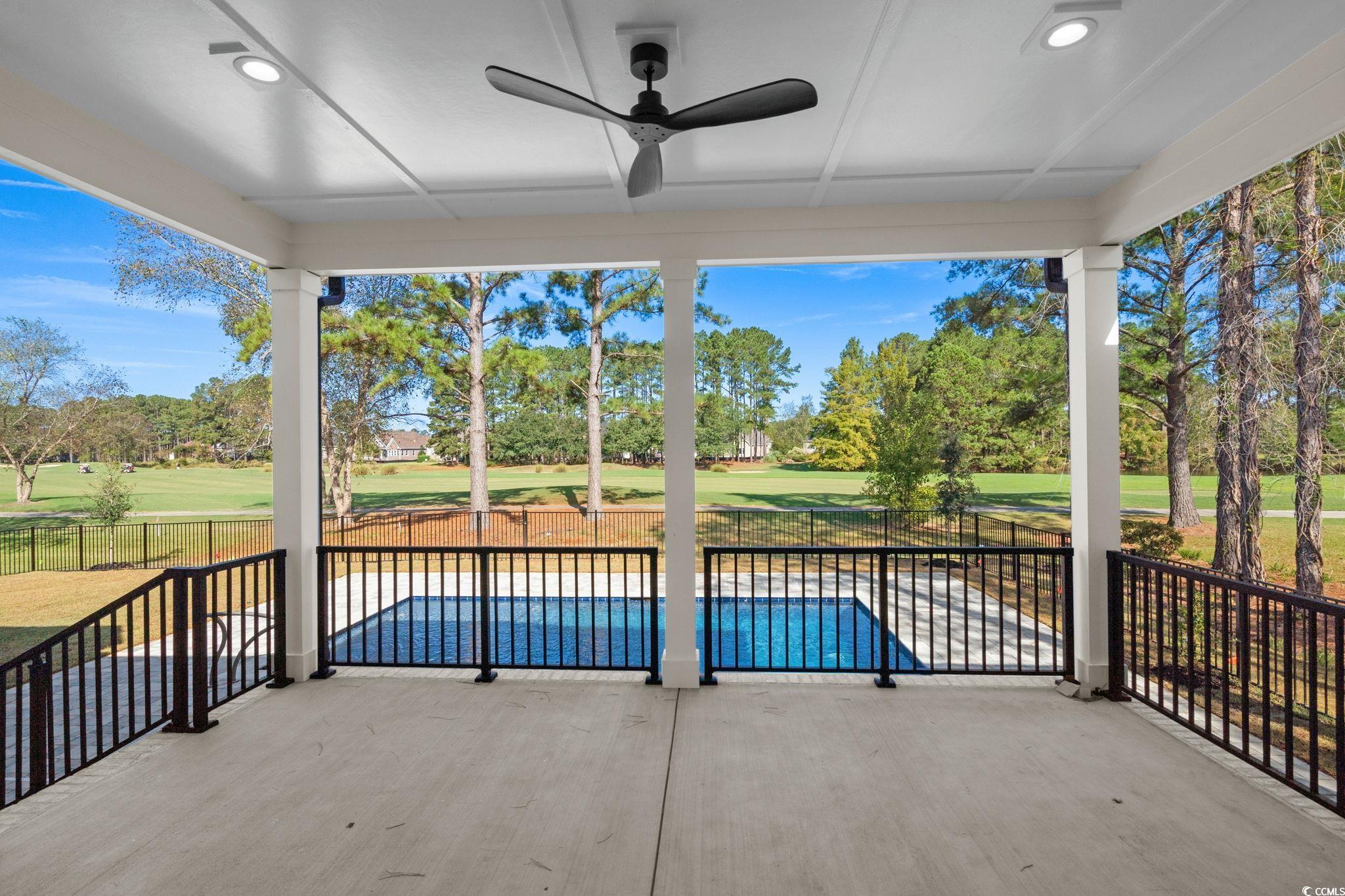 9282 Checkerberry Square Calabash, NC 28467 - Photo 29 of 40 View of patio / terrace with ceiling fan and golf course view