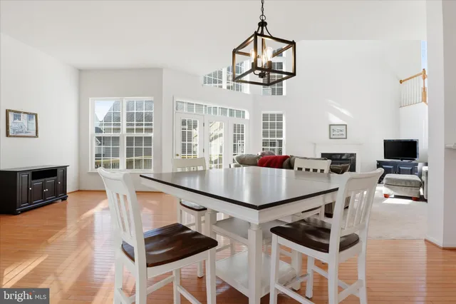 a living room with furniture and flat screen tv