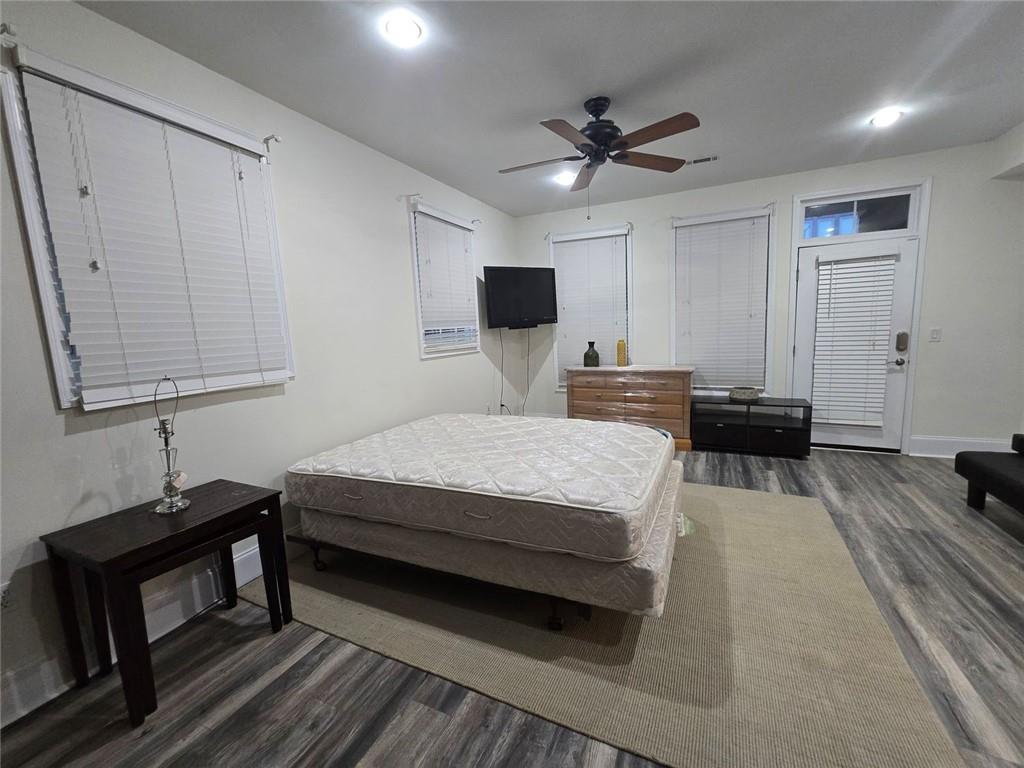 Undisclosed Address Atlanta, GA 30313 - Photo 2 of 6 a bedroom with a bed and a flat screen tv