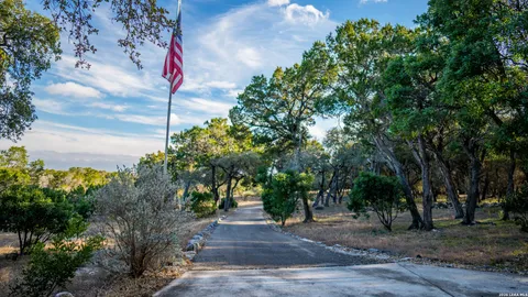 a view of a swimming pool with a garden