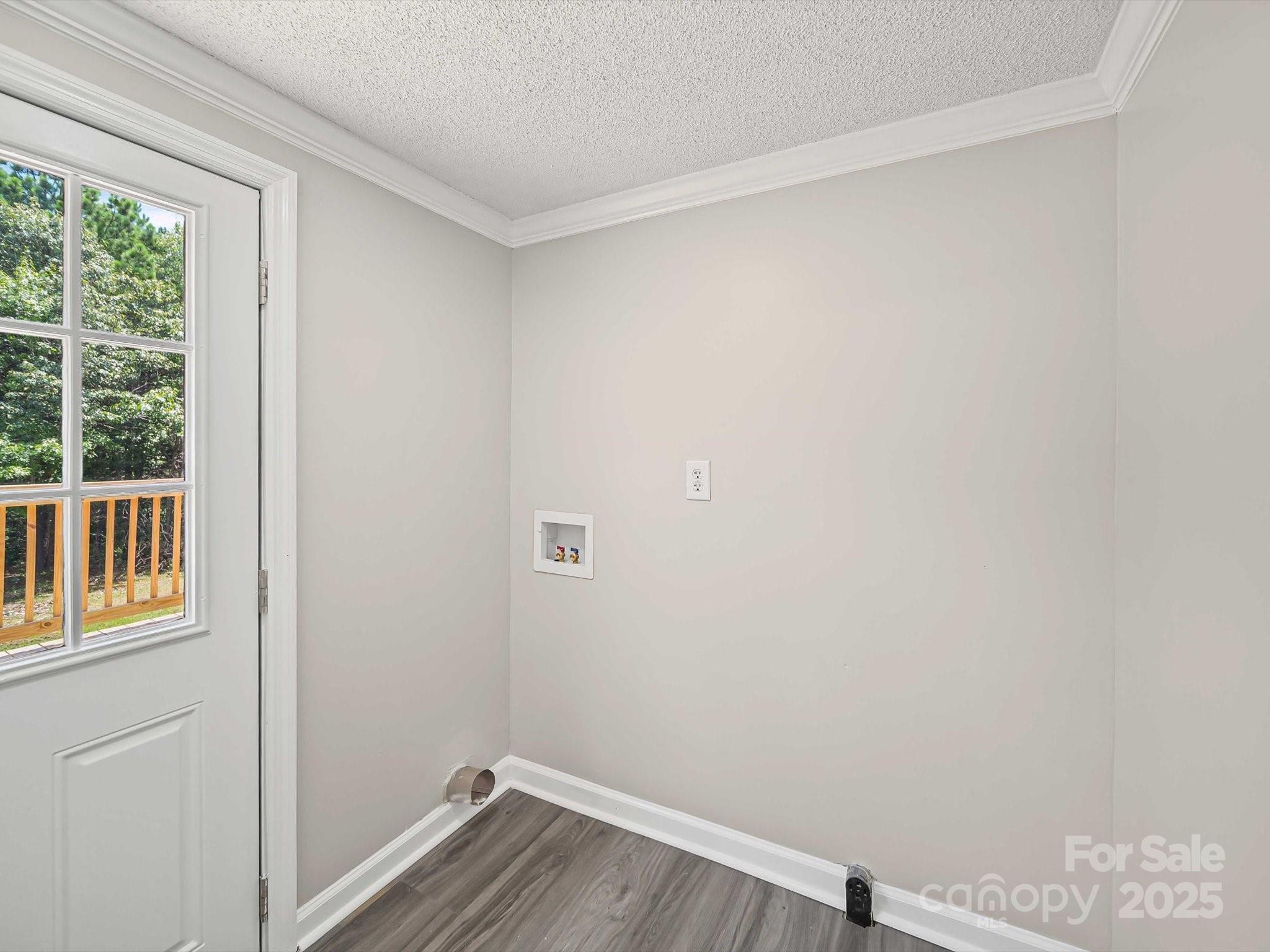 147 Xienghone Road Mount Gilead, NC 27306 - Photo 18 of 22 a view of a small space with wooden floor and a window