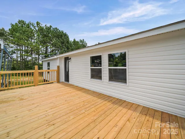 a view of a backyard of the house