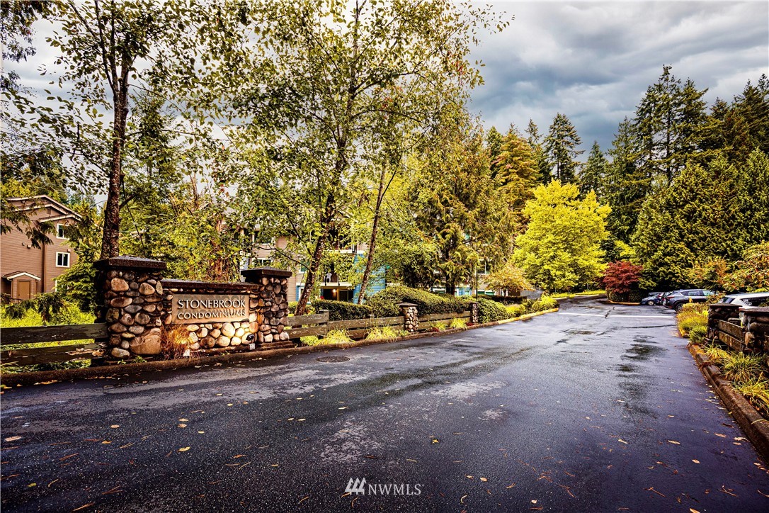 19410 Bothell Way Northeast, Unit D201 Bothell, WA 98011 - Photo 21 of 22 a view of a street with some trees