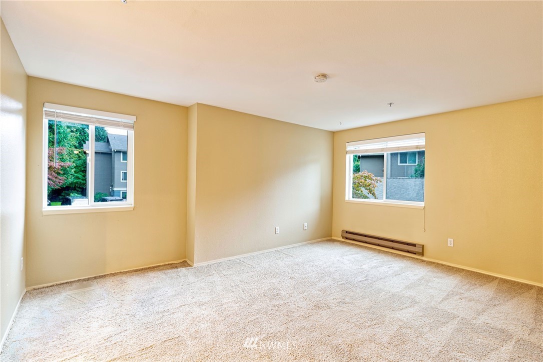 19410 Bothell Way Northeast, Unit D201 Bothell, WA 98011 - Photo 9 of 22 a view of an empty room with a window