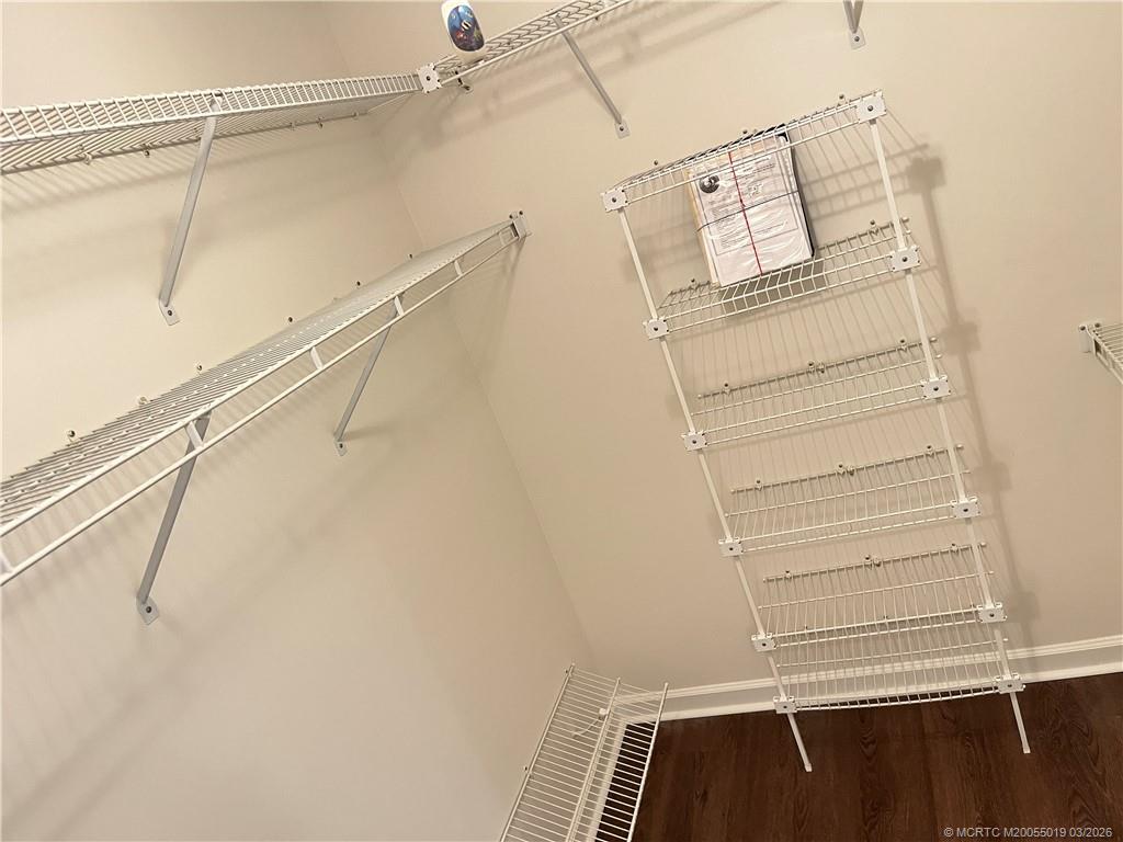 579 Northeast Plantation Road, Unit S303 Jensen Beach, FL 34957 - Photo 13 of 25 Primary bedroom closet