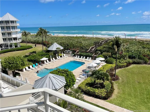 a view of a swimming pool and outside space