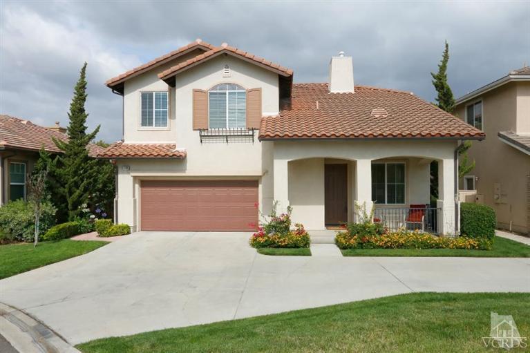 1636 Marigold Lane Simi Valley, CA 93065 - Photo 1 of 21 a front view of a house with a yard and garage