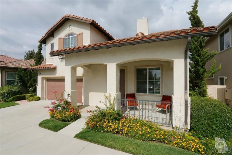 1636 Marigold Lane Simi Valley, CA 93065 - Photo 2 of 21 a front view of a house with garden