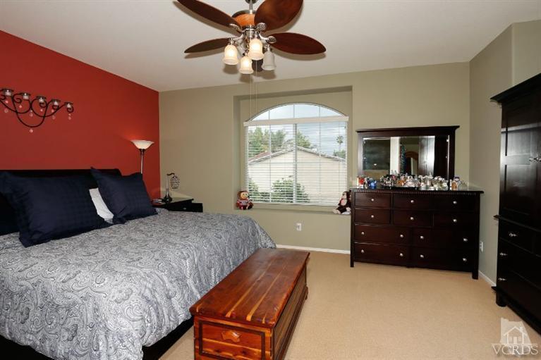 1636 Marigold Lane Simi Valley, CA 93065 - Photo 12 of 21 a bed room with a bed and a large window