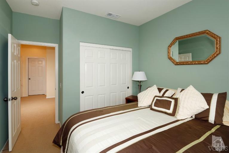 1636 Marigold Lane Simi Valley, CA 93065 - Photo 15 of 21 a bedroom with a bed and a lamp