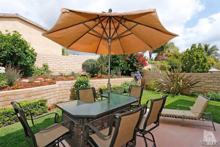 1636 Marigold Lane Simi Valley, CA 93065 - Photo 19 of 21 a view of an outdoor sitting area with furniture and umbrella