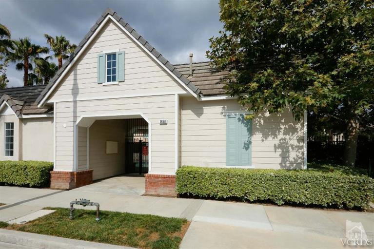 1636 Marigold Lane Simi Valley, CA 93065 - Photo 20 of 21 a front view of a house with a garden