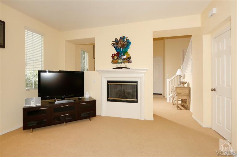 1636 Marigold Lane Simi Valley, CA 93065 - Photo 8 of 21 a living room with furniture and a flat screen tv