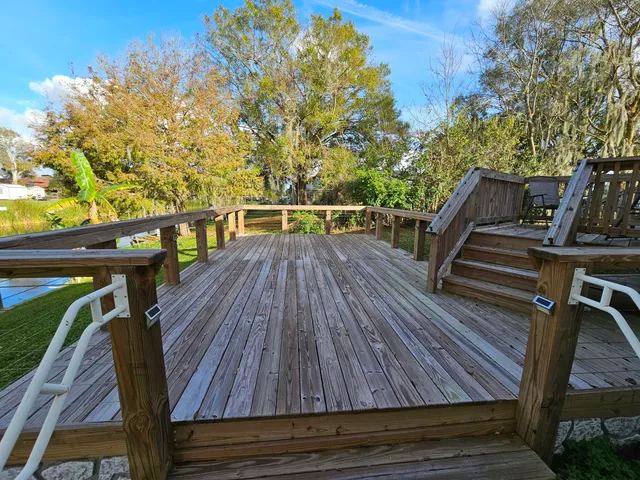 a view of a balcony with chairs