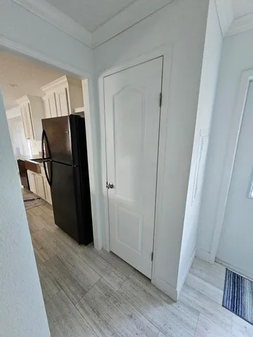 a utility room with storage and utility