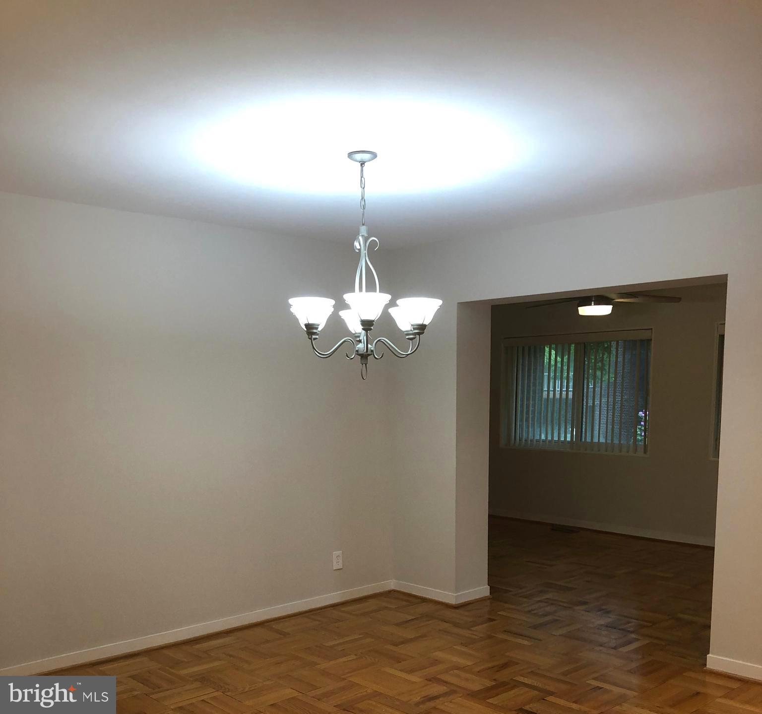 14 Stonehenge Circle, Unit 6 Baltimore, MD 21208 - Photo 6 of 31 DINING ROOM INTO SOLARIUM