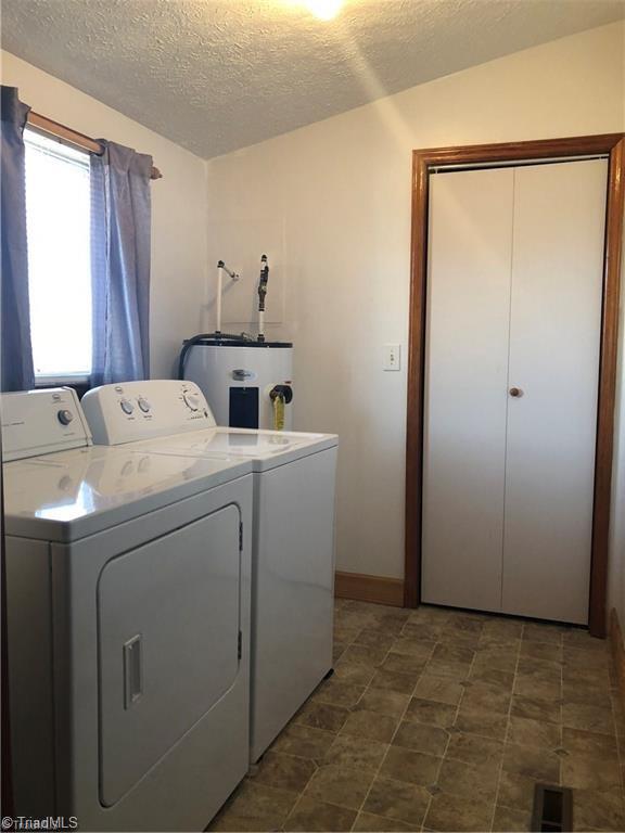 2290 Simmons Road Westfield, NC 27053 - Photo 20 of 26 laundry room and closet