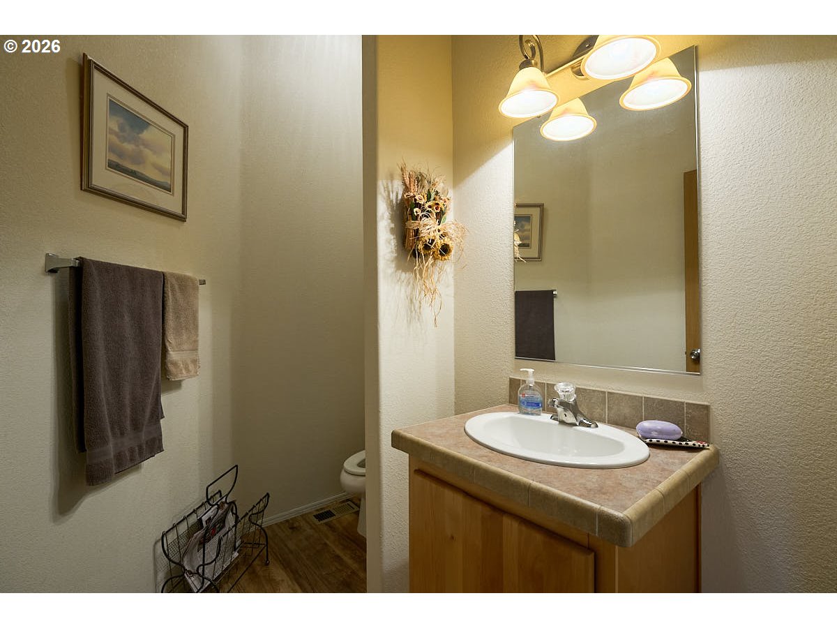 67079 Lostine River Road Lostine, OR 97857 - Photo 11 of 41 a bathroom with a sink mirror and a shower
