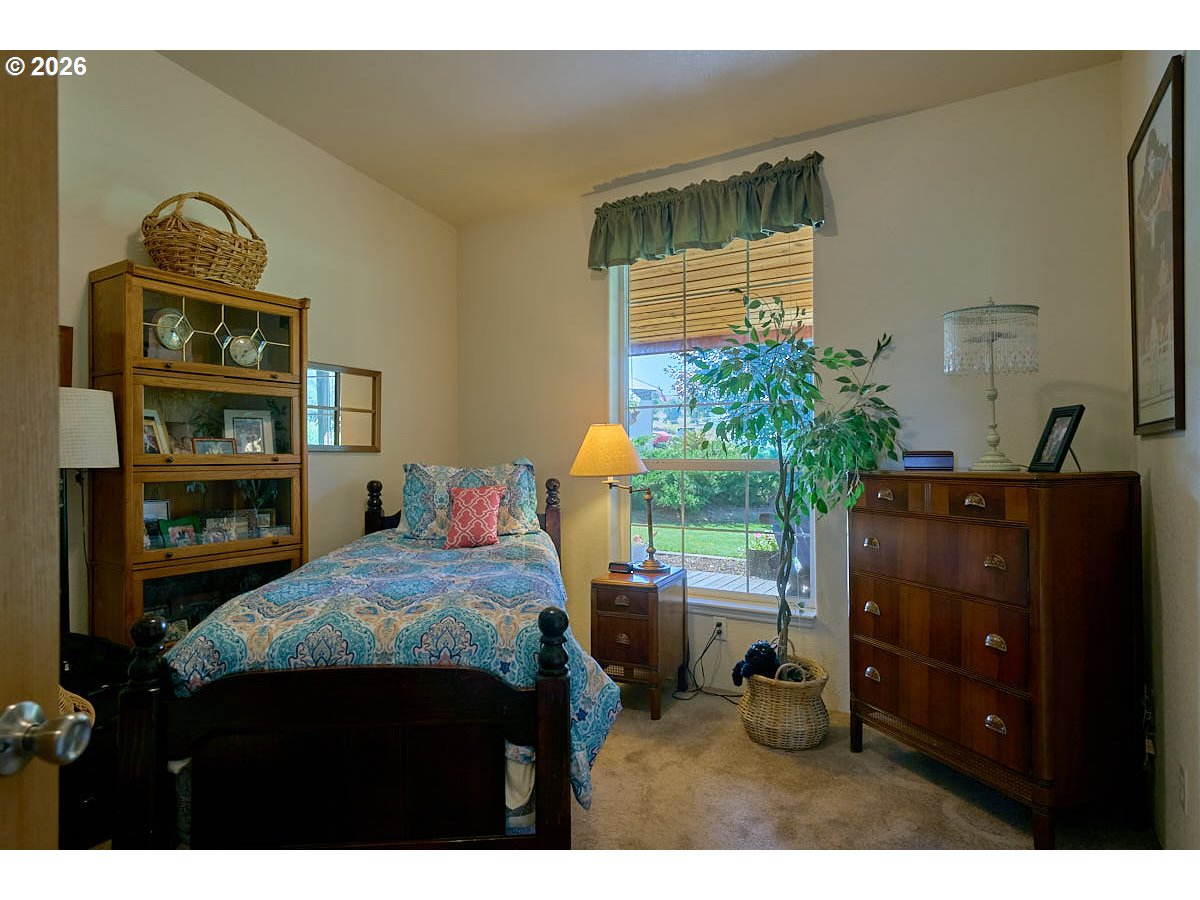 67079 Lostine River Road Lostine, OR 97857 - Photo 21 of 41 a bedroom with a bed and the view of living room