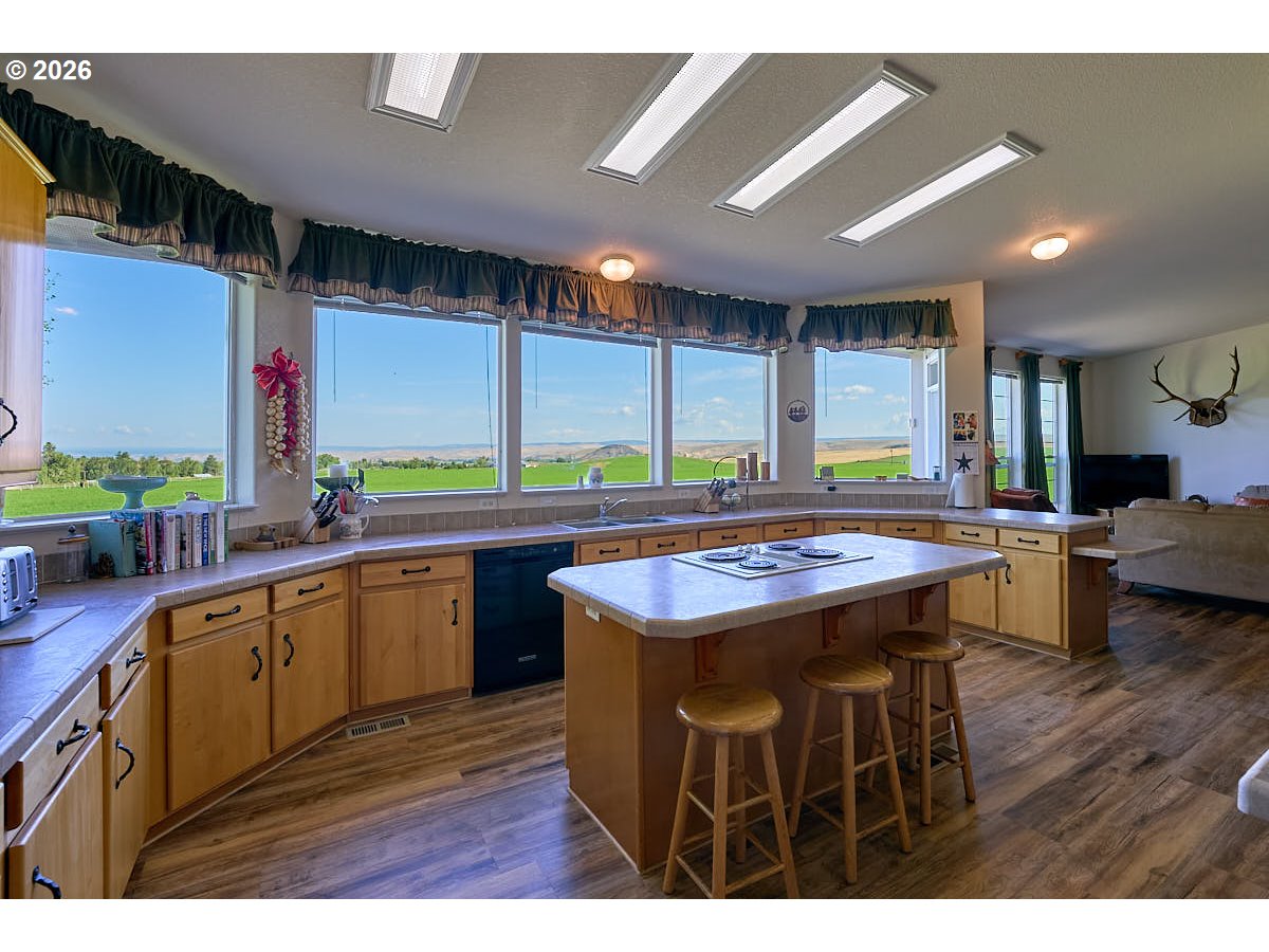 67079 Lostine River Road Lostine, OR 97857 - Photo 6 of 41 a kitchen with a table and chairs in it