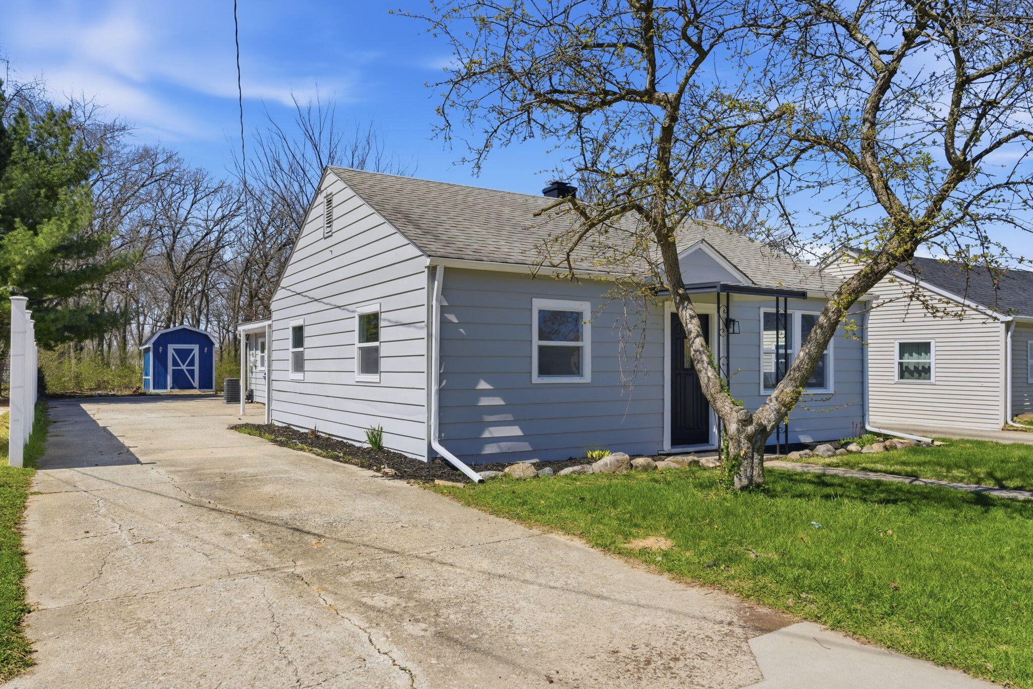 207 Harrington Avenue Crown Point, IN 46307 - Photo 1 of 21 a view of a house with a yard