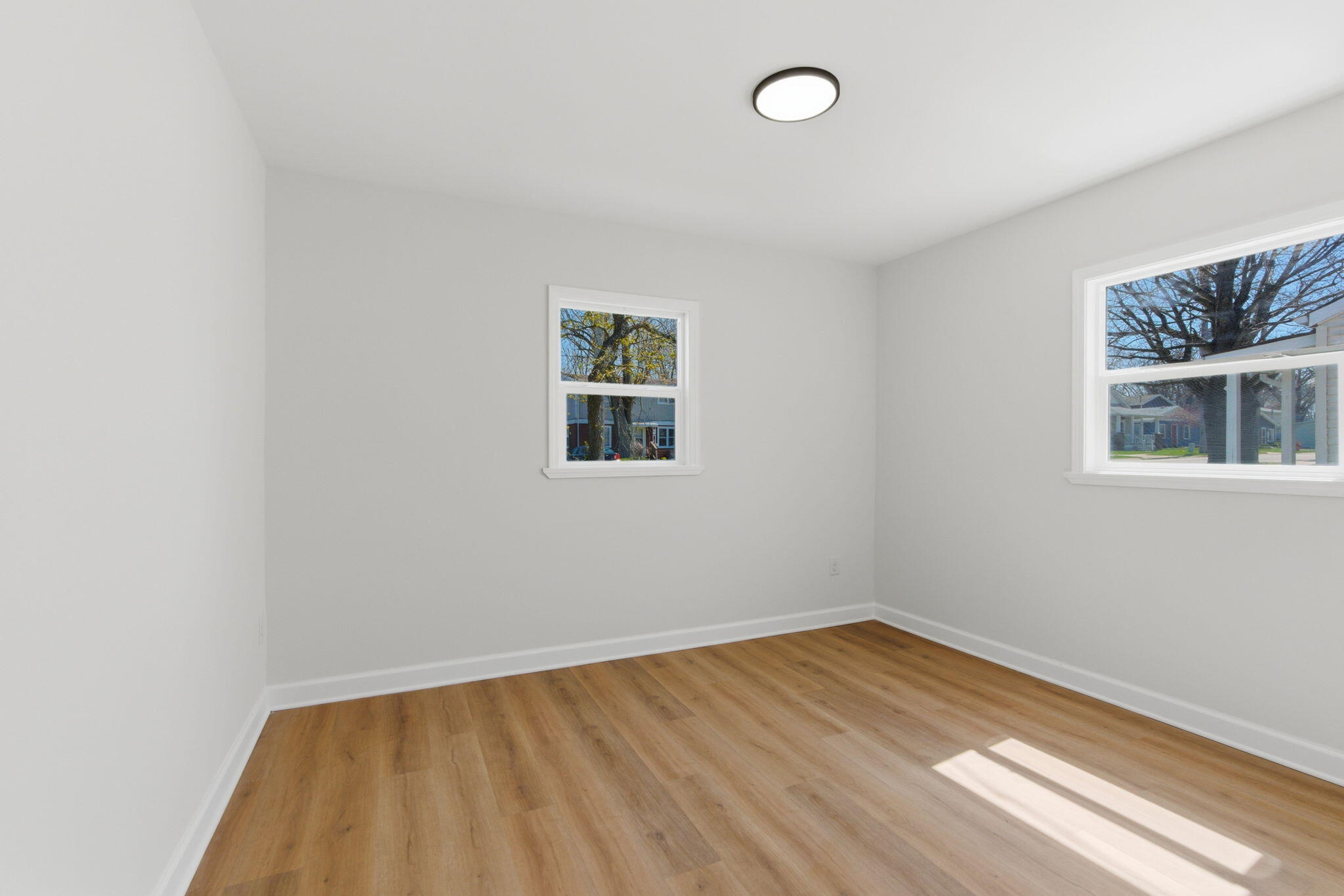 207 Harrington Avenue Crown Point, IN 46307 - Photo 17 of 21 an empty room with a window
