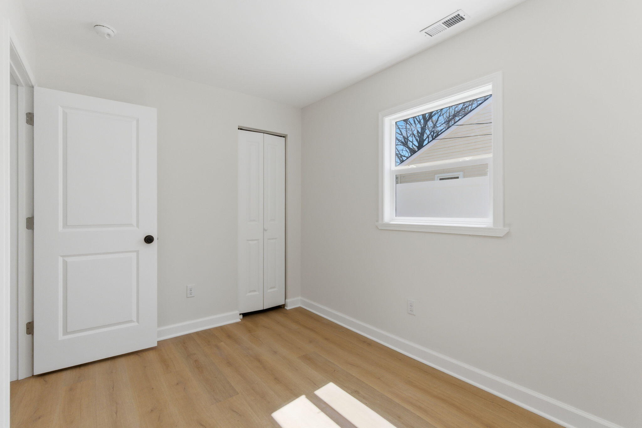 207 Harrington Avenue Crown Point, IN 46307 - Photo 20 of 21 a view of empty room with wooden floor