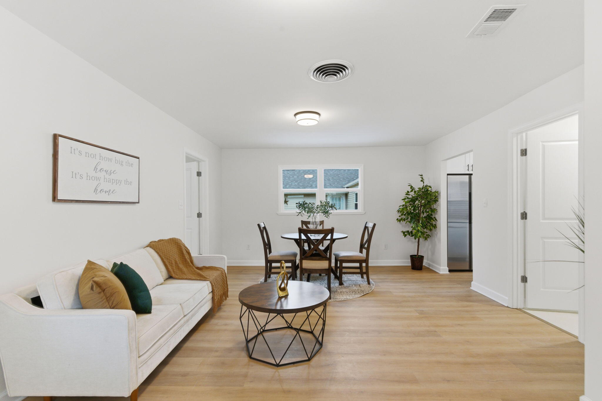 207 Harrington Avenue Crown Point, IN 46307 - Photo 10 of 21 a living room with furniture and white walls
