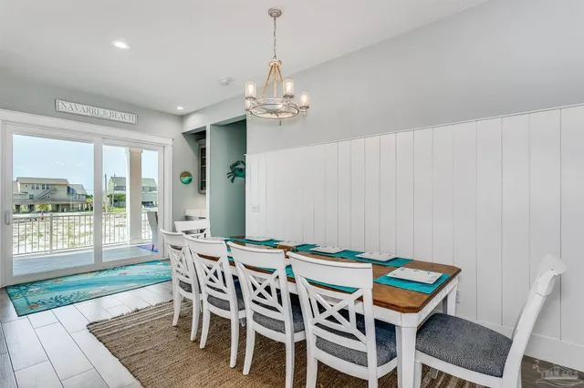 a outdoor living room with furniture and a window