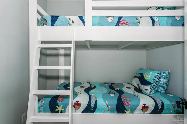 a view of swimming pool with outdoor seating and city view