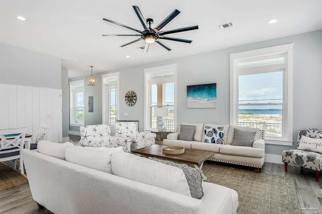 a large kitchen with a table and chairs