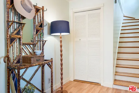 a view of entryway with wooden floor