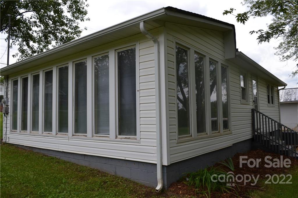 2751 Lail Road Morganton, NC 28655 - Photo 13 of 32 a view of wooden house with a small yard