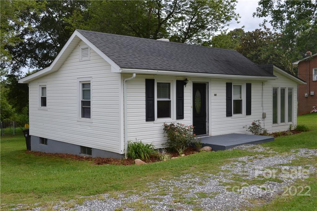 2751 Lail Road Morganton, NC 28655 - Photo 14 of 32 a view of a house with a yard plants and large tree