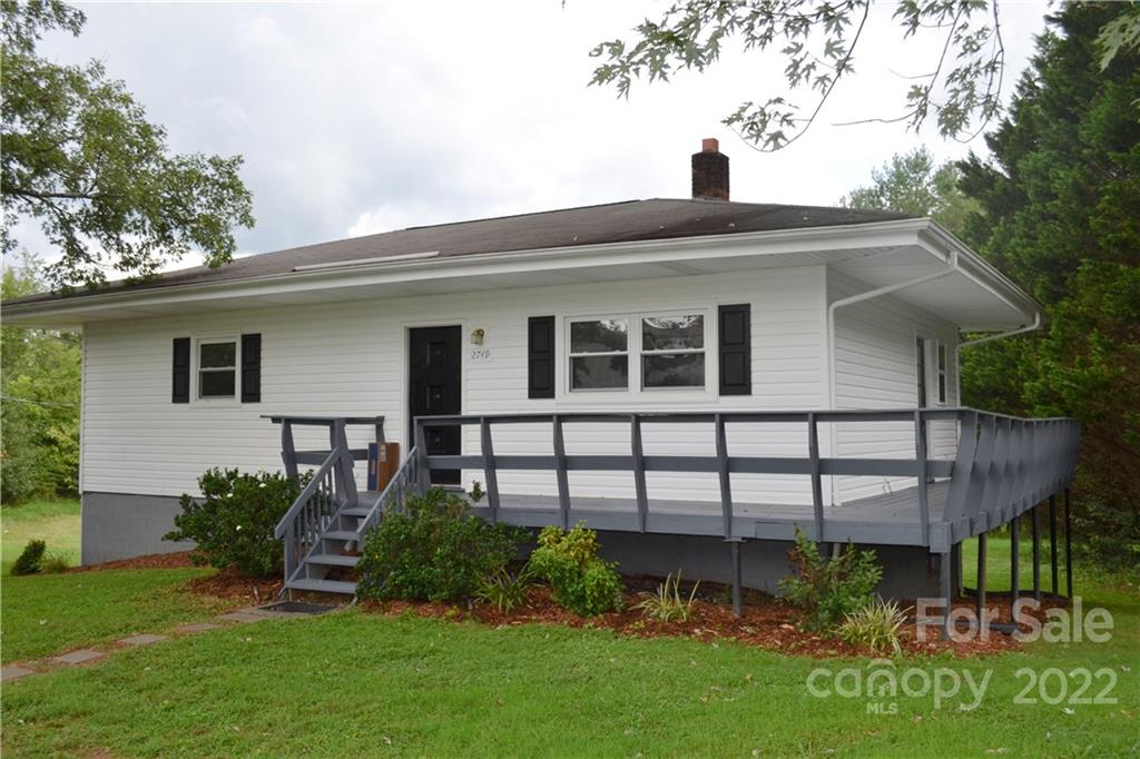 2751 Lail Road Morganton, NC 28655 - Photo 16 of 32 a front view of a house with a yard