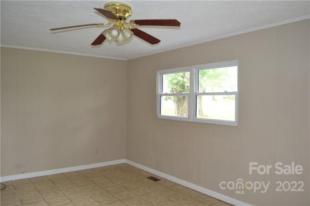 2751 Lail Road Morganton, NC 28655 - Photo 17 of 32 wooden floor in an empty room with a window