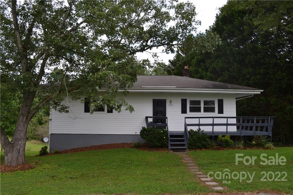 2751 Lail Road Morganton, NC 28655 - Photo 30 of 32 a view of a house with a yard