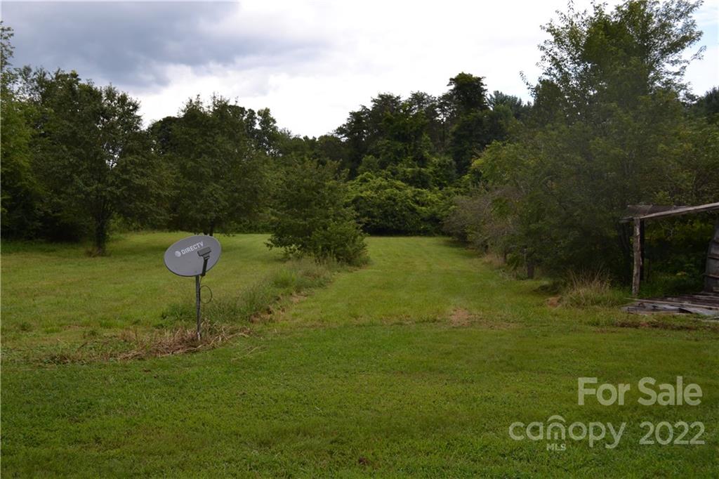 2751 Lail Road Morganton, NC 28655 - Photo 31 of 32 a swimming pool with trees in the background