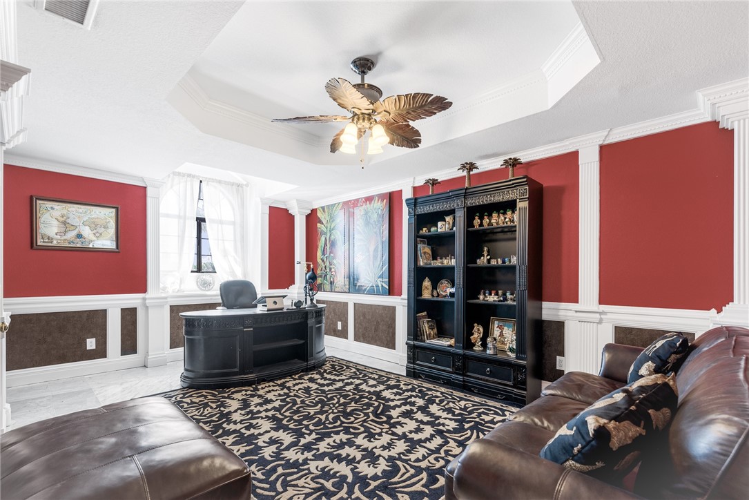 15910 El Soccorro Loop Corpus Christi, TX 78418 - Photo 30 of 40 a living room with furniture a piano and a fireplace