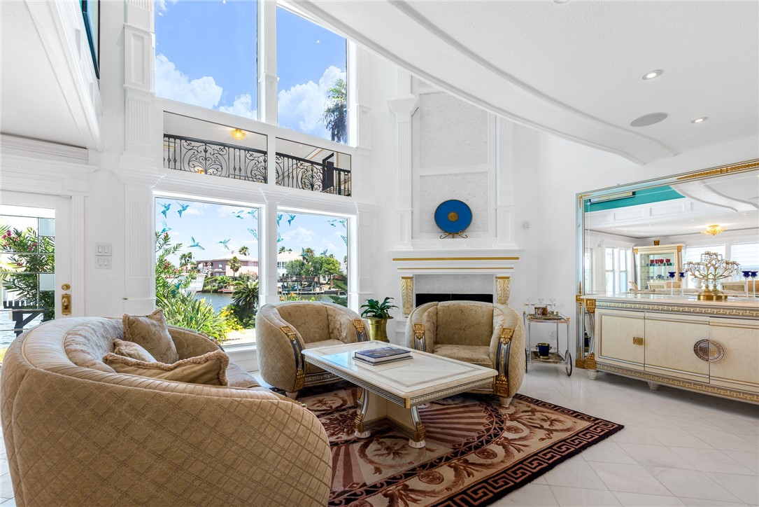 15910 El Soccorro Loop Corpus Christi, TX 78418 - Photo 10 of 40 a living room with furniture and a fireplace
