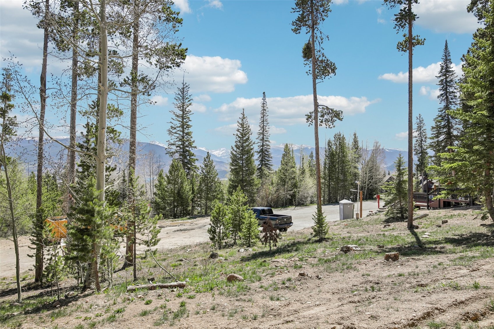 89310 Ryan Gulch Road, Unit 103 Silverthorne, CO 80498 - Photo 26 of 48 a view of a city with tall trees