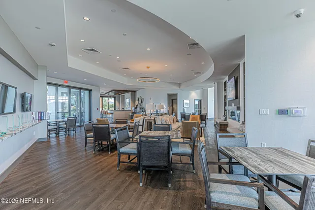 a very nice looking room with wooden floor