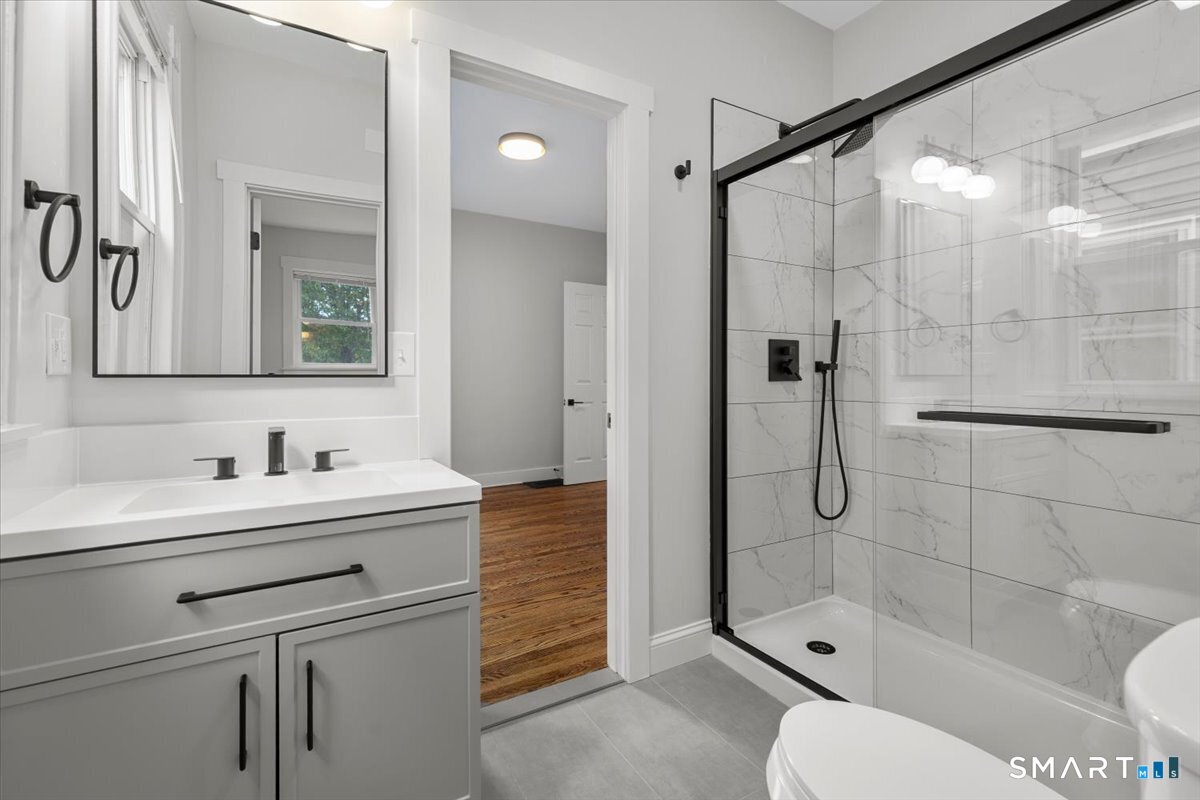 36 Maple Street, Unit 2 New Haven, CT 06511 - Photo 16 of 20 a bathroom with a sink toilet and shower